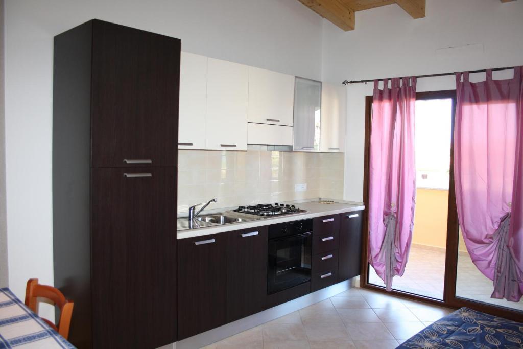Appartamenti Ideal Isola Rossa Chambre photo