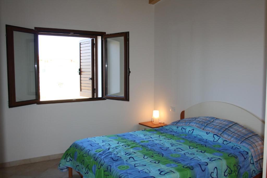 Appartamenti Ideal Isola Rossa Chambre photo